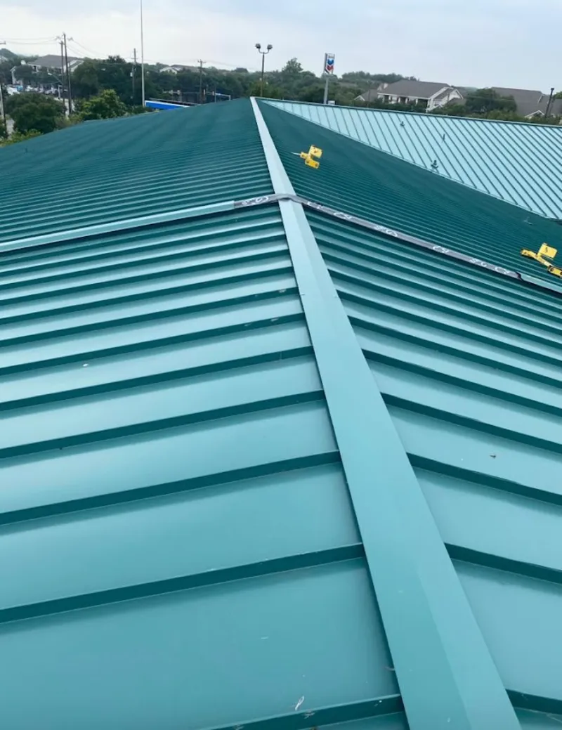 Green commercial metal roof ridge and valley for Metal Roof Repair in Pleasant Hills